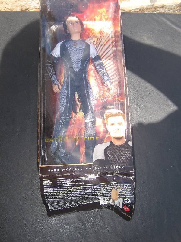 lot 5164 image: The Hunger Games Catching Fire Collectors Black Label Peeta Doll