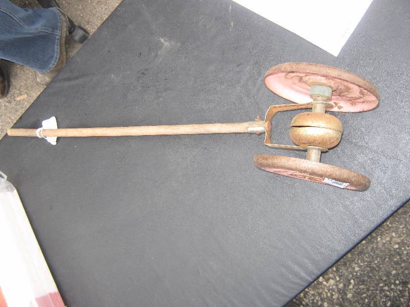lot 5167 image: antique vintage rolling push toy wooden handle 23 long metal wheels