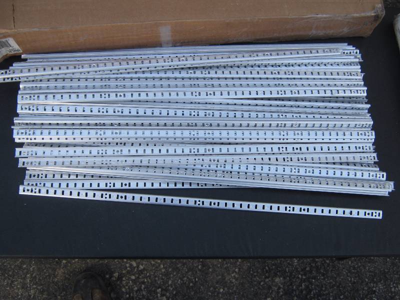lot 5207 image: 100 ct. lot 24 Aluminum standard shelf rails, brackets not included