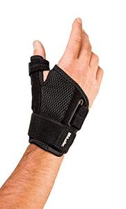 lot 4573 image: Mueller Reversible Thumb Stabilizer, Black, One Size Fits Most  Stabilizing Thumb Brace
