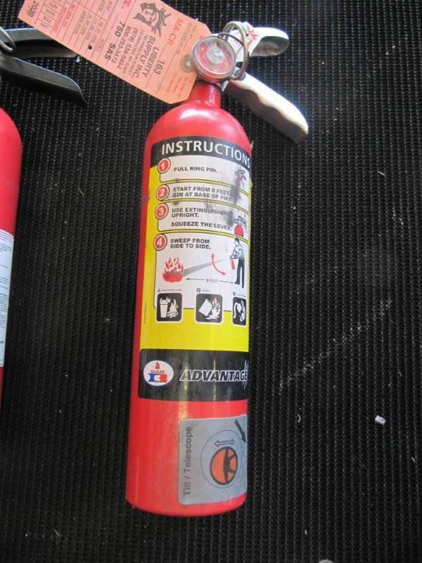 lot 1530 image: 3 LB Fire Extinguisher Fully charged
