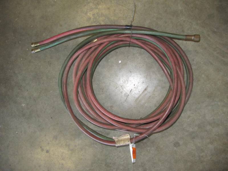 lot 1543 image: Just Removed from Serivce Tanks Oxygen and Acetylene Hose Approx. 20