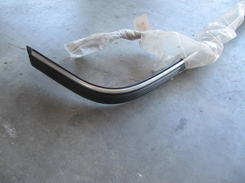 lot 1569 image: NEW BUMPER GUARD and hardware Appears to be Chevrolet