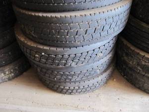 lot 5005 image: 7 - 11x24.5 Used Tires - Lot of usage Left