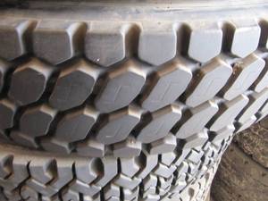 lot 5009 image: Lot of 6  11x24.5 Tires  1 New Tire and 5 Road Worthy Tires