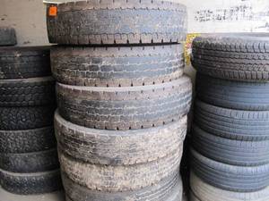 lot 5010 image: 7 11x24.5 Tires Road