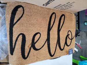 lot 1653 image: 23in x 36in Hello door Mat