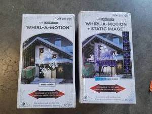 lot 1697 image: Gemmy Led White Whirl-a-motion Snowflake Images Christmas Lightshow Projector