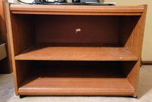 lot 5243 image: Faux Wood TV Stand on Wheels - rolls easily