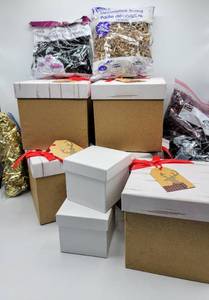lot 5396 image: Lot of new Gift Boxes  Bags of Filler Shred