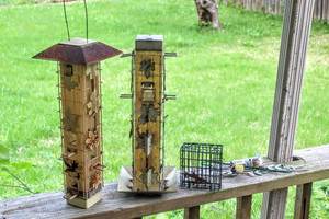 lot 5319 image: (2) Wild Bird Feeder Towers, EZ Fill Suet Basket and Decorative Hanger Hooks
