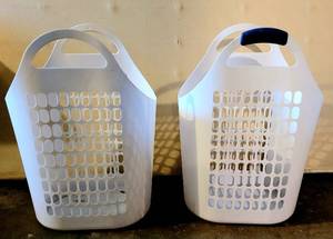 lot 5270 image: (2) White Plastic Laundry Baskets