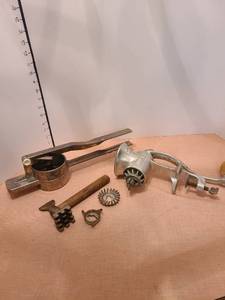 lot 1324 image: Vintage meat grinder, tenderizer and press