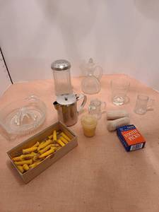 lot 1352 image: Juicer, Creamer, toothpicks, corn holders, And more