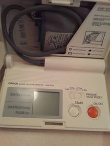lot 1512 image: Arm Sling and OMRON Blood Pressure Monitor