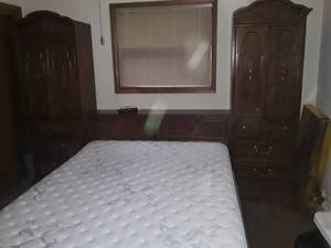 lot 1600 image: THOMASVILLE QUEEN Size Bed Set. Headboard and 2 Side Armoires , and Mattress. Headboard is 35 x 64 x 17. Armoire are 78 x 28 x 17 each. Mattress is a SIMMONS Quilt Top