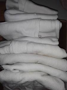 lot 1630 image: Mens Under Shirts. Sleeveless Size Medium