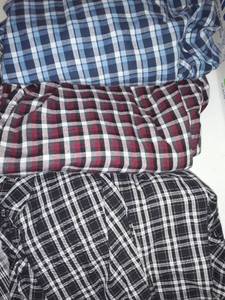 lot 1633 image: Mens Pajamas 3 sets. (pants and tops) Size Medium