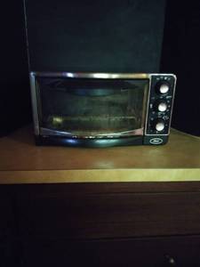 lot 2003 image: Oster Black Toaster Oven