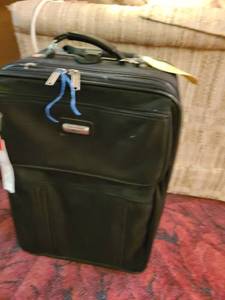 lot 2016 image: Soft sided luggage 14 by 22 and duffle bag
