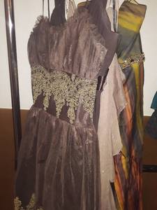lot 1525 image: 4 More Prom Dresses. Mostly Sized 34 and a 7