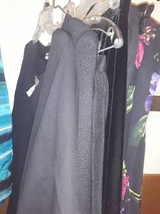 lot 1533 image: Ladies black skirts (4), dress and a top. Sized Small to Large