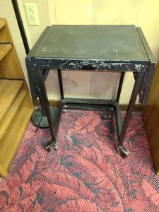 lot 2045 image: Black metal typewriter table on wheels