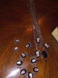 lot 1156 image: Vintage Silhouette Jewelry Clip on Earrings 1 Ring 1 Bracelet and 4 Necklaces