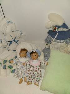 lot 1200 image: Baby dolls and bunny with pillow and blanket