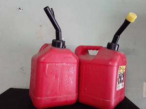 lot 3001 image: 2) 2 gallon and 8 oz. Gas Cans