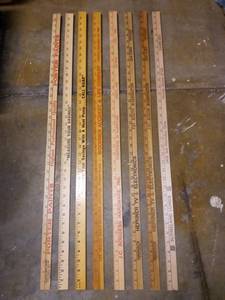 lot 3103 image: Yard Sticks Lot of 8