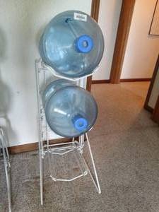 lot 24002 image: Two  5 Gallon Bottles and Metal Storage Rack