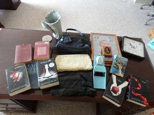 lot 24047 image: Stephenie Meyer Twilight Saga Books - Purses - Slab Vase - Razor - Frames - Clock
