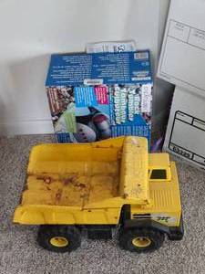 lot 24196 image: Tonka Dump Truck w Rock Tumbler