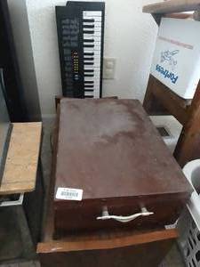 lot 24159 image: Desktop Electric Organ - Keyboard - Flatware Set and Student Desk