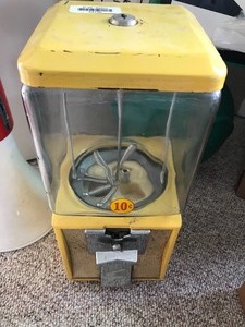 lot 24136 image: Yellow Coin Operated Candy Machine