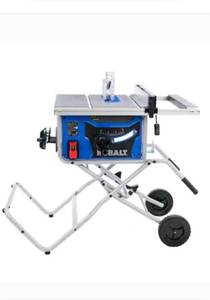 lot 1133 image: kobalt 10 inch table Saw. looks like used once or twice. plugged in and works.