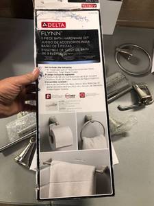 lot 1157 image: Delta Flynn Fly63-dn 3-piece Bath Hardware Set Spotshield Brushed Nickel Finish. two Boxes in lot