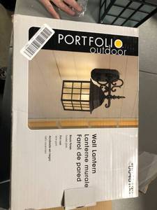 lot 1162 image: Portfolio Outdoor Wall Lantern Metal black finish frosted glass 0048183. looks complete.