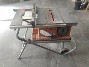 lot 104 image: Rigid TS2400-1 Table Saw on Rolling Stand