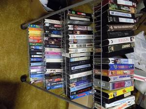 lot 5438 image: VHS Tapes (74 ea) & Display Rack