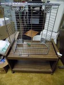lot 5477 image: TV Stand on Casters & Wire Basket