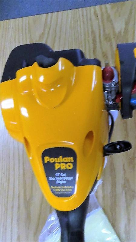lot 3066 image: Poulan Pro 17-Inch 25cc 2-Cycle Gas-Powered Curved-Shaft String Trimmer with Split Shaft