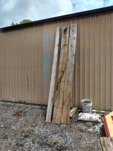 lot 412 image: 2. 1x10s 10 ft long and one one by six 10 ft long new but weathered