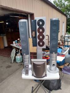 lot 427 image: The Sharper Image vertical 4 CD stereo with AM FM digital PLL tuner with subwoofer plugged in powers on no further testing done
