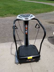lot 435 image: Merax whole body vibrating machine and exerciser with papers plugged in works
