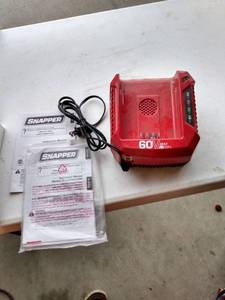 lot 467 image: snapper 60 v Max li ion battery charger untested with papers