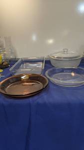 lot 1478 image: Pyrex dishes two pie pans cake pan and casserole dish