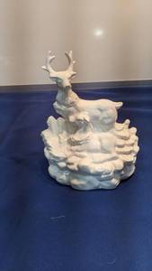 lot 1525 image: musical buck figurine