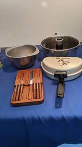 lot 1556 image: angel food pan omelette pan mixing bowl and knives